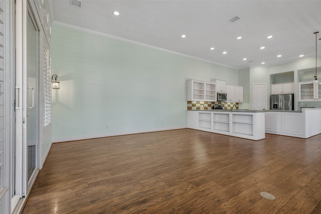 unfurnished living room with ceiling fan, dark hardwood / wood-style floors, and ornamental molding