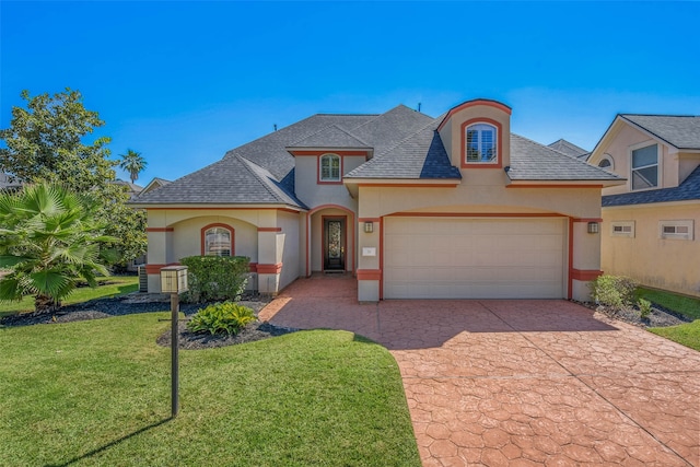 french country style house with a front lawn