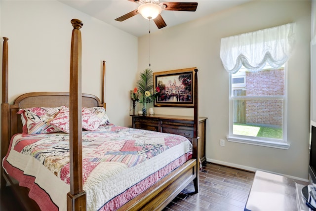 bedroom featuring ceiling fan and dark hardwood / wood-style flooring