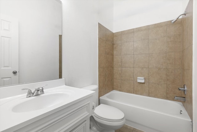 full bathroom with tiled shower / bath combo, vanity, and toilet