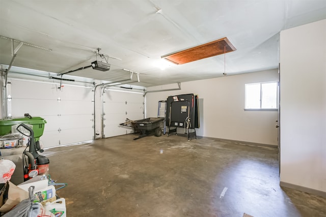 garage featuring a garage door opener