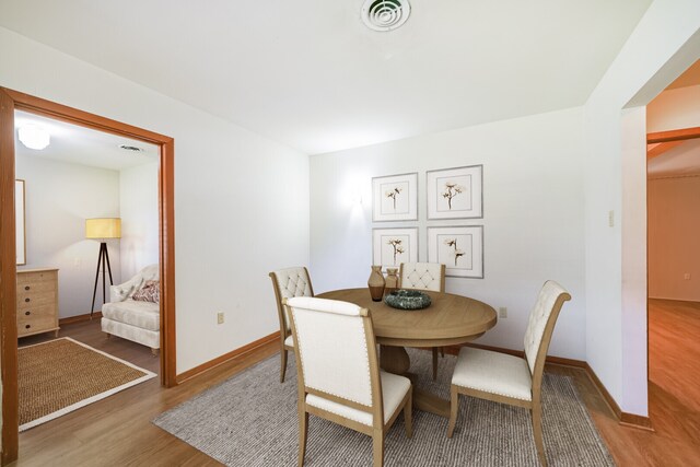 dining room featuring dark wood-type flooring