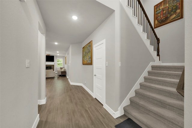 corridor featuring hardwood / wood-style flooring