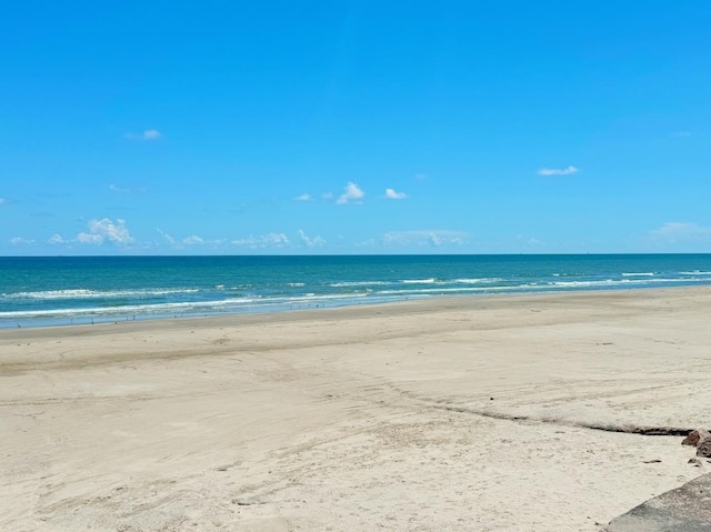 property view of water featuring a beach view