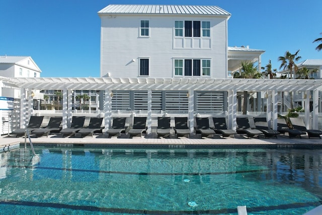 view of swimming pool with a pergola