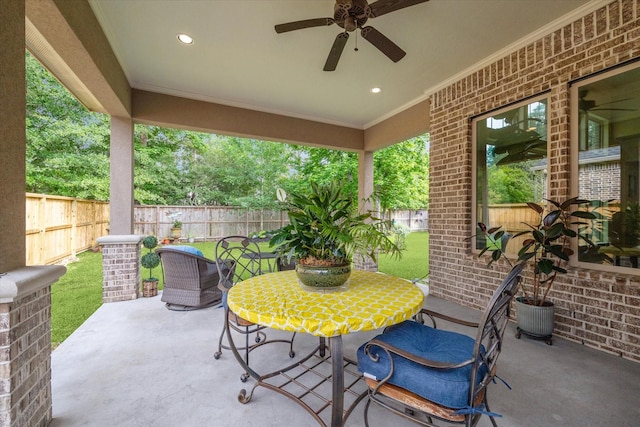 view of patio featuring a fenced backyard and a ceiling fan