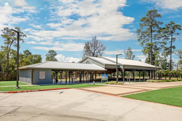 view of community featuring a yard