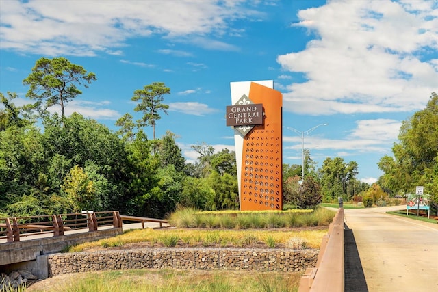 view of community with fence