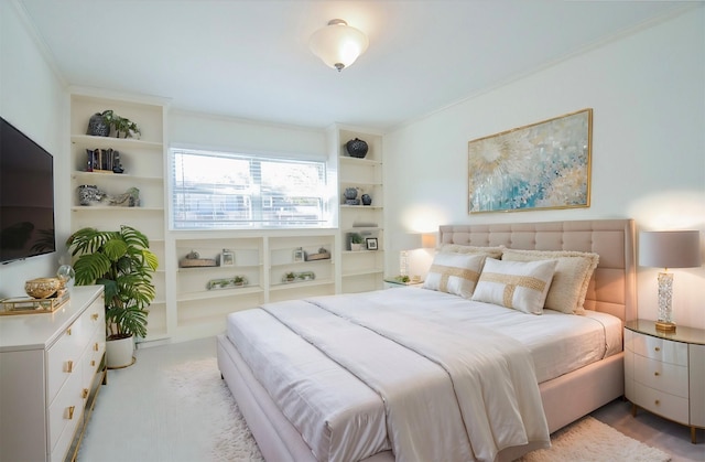 bedroom with crown molding