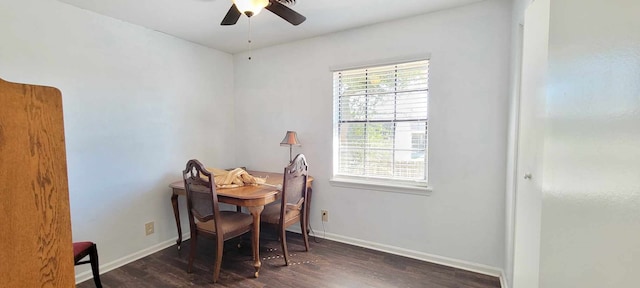 dining space featuring ceiling fan and dark hardwood / wood-style floors