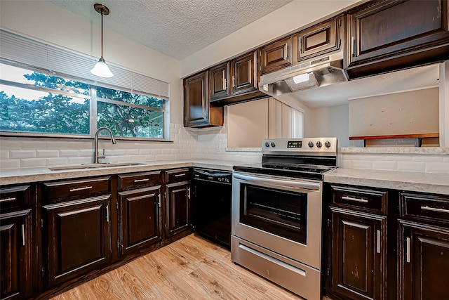 kitchen with black dishwasher, sink, pendant lighting, stainless steel electric range oven, and extractor fan