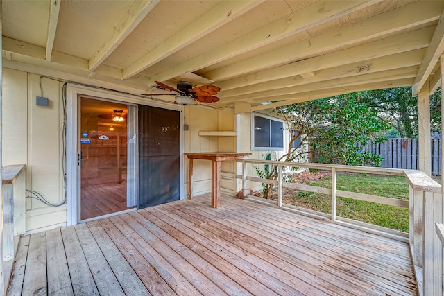 wooden deck with ceiling fan