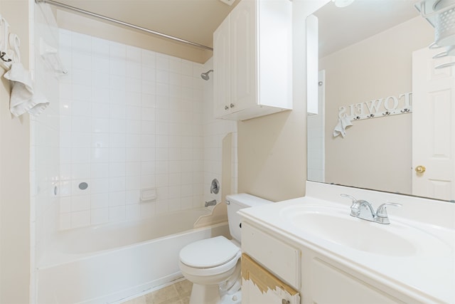 full bathroom with vanity, toilet, and tiled shower / bath