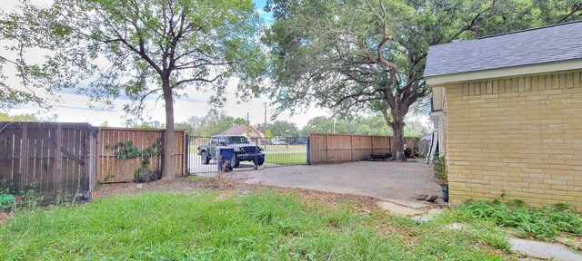 8 Abalone St, Bay City, TX 77414 - view of yard featuring fence and a patio area