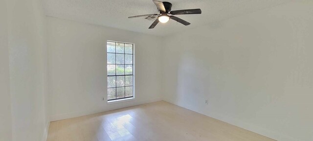 8 Abalone St, Bay City, TX 77414 - unfurnished room featuring ceiling fan and a textured ceiling