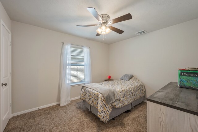 carpeted bedroom with ceiling fan