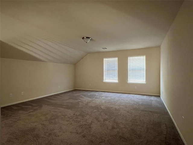 331 W Bend Dr, League City, TX 77573 - bonus room featuring dark carpet and vaulted ceiling