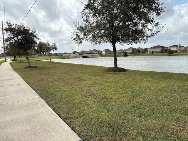 331 W Bend Dr, League City, TX 77573 - view of green lawn featuring a water view and a residential view