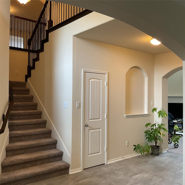 331 W Bend Dr, League City, TX 77573 - stairway with arched walkways and baseboards