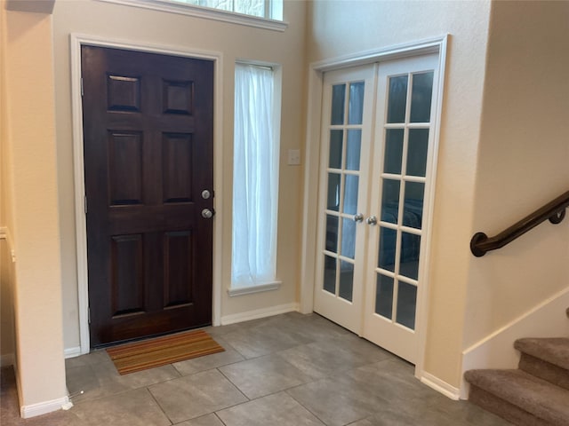 331 W Bend Dr, League City, TX 77573 - entryway featuring french doors, stairs, and tile patterned floors