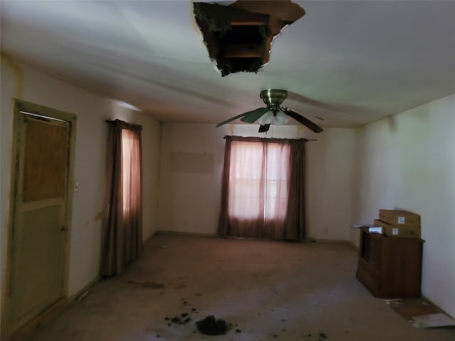 unfurnished room featuring ceiling fan