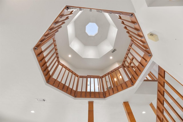 room details with visible vents and recessed lighting