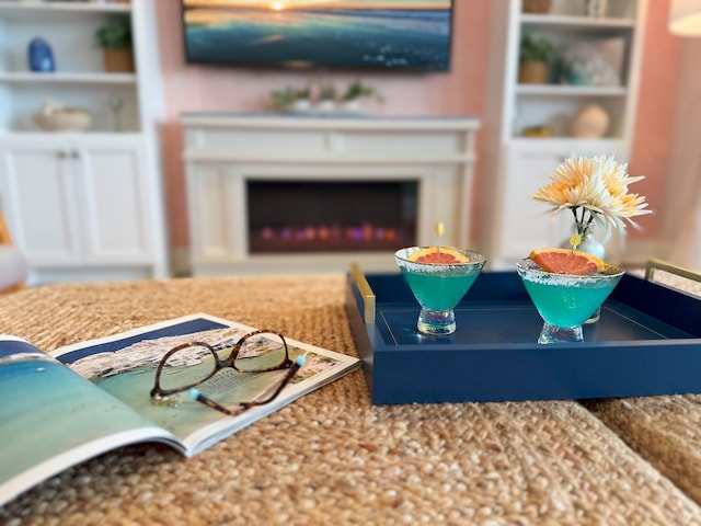 living area featuring a fireplace
