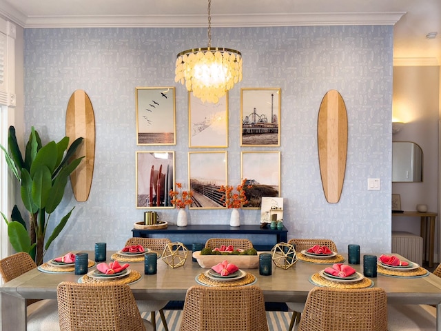 dining space with wallpapered walls, a chandelier, and crown molding