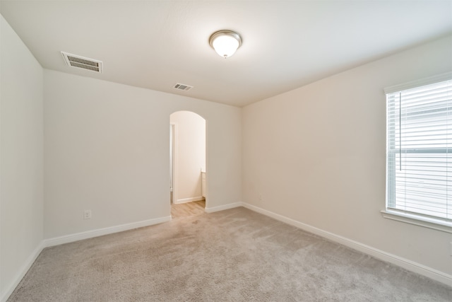 view of carpeted spare room