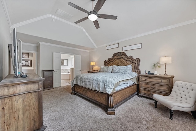 carpeted bedroom with crown molding, lofted ceiling, ceiling fan, and ensuite bathroom