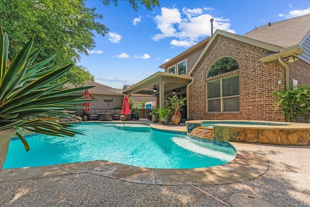 view of swimming pool featuring a patio, an in ground hot tub, and ceiling fan