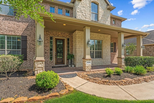 doorway to property with a porch