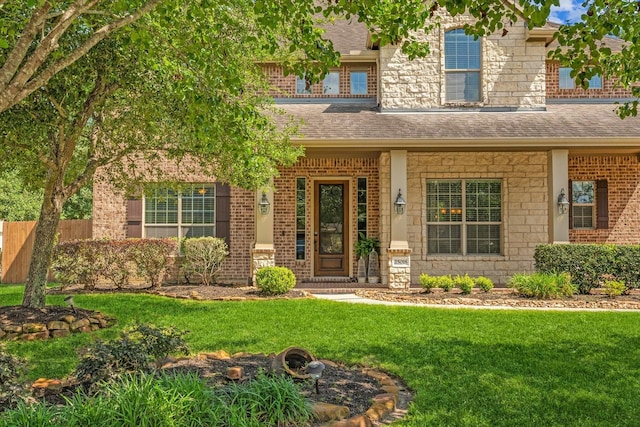 view of front of home with a front lawn