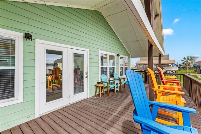 wooden terrace featuring french doors