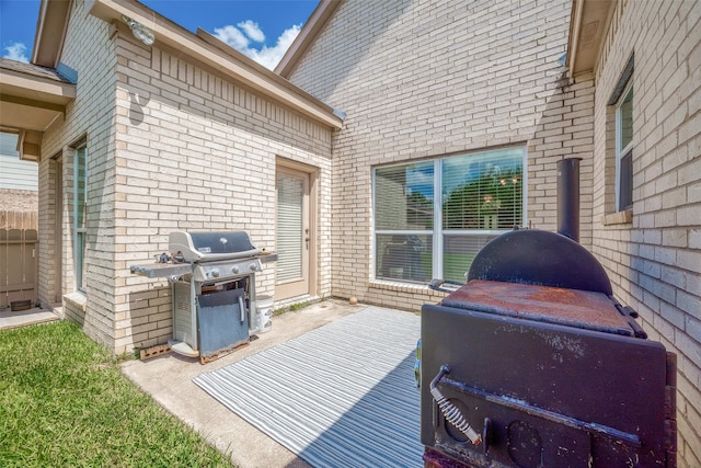 view of patio with a grill