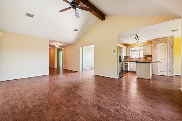 unfurnished living room with high vaulted ceiling, ceiling fan, beamed ceiling, and dark wood-type flooring