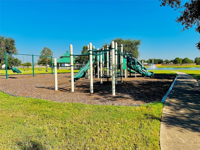 view of playground featuring a yard