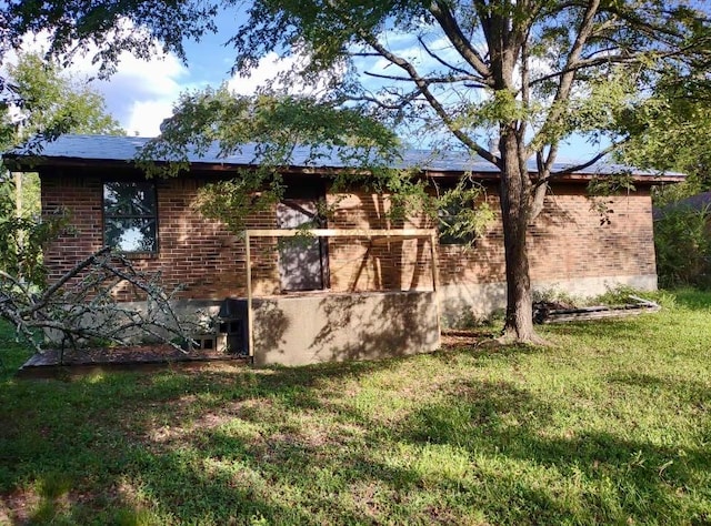 view of property exterior featuring a yard