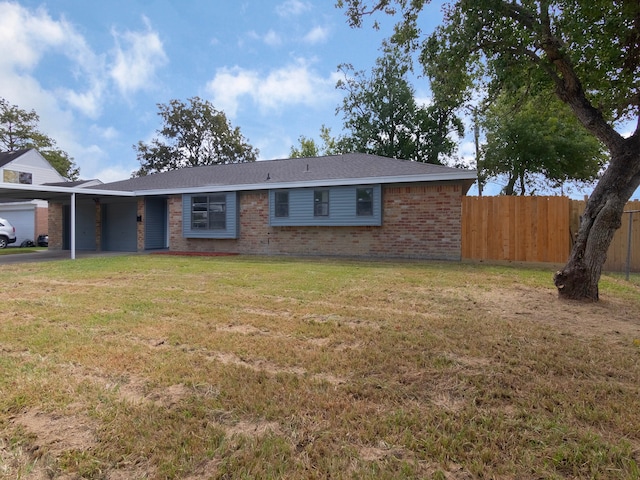 single story home featuring a front yard