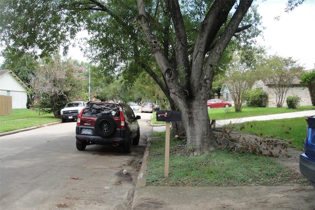 view of road featuring curbs