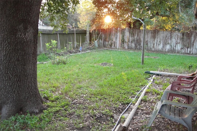 view of yard featuring a fenced backyard