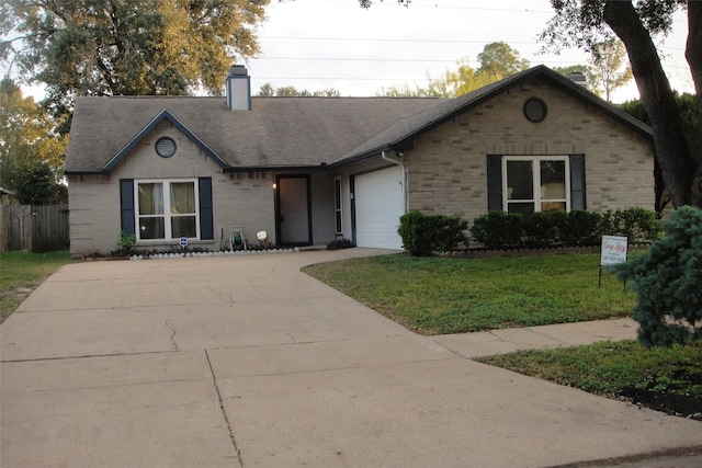 single story home with a garage, a chimney, concrete driveway, and brick siding