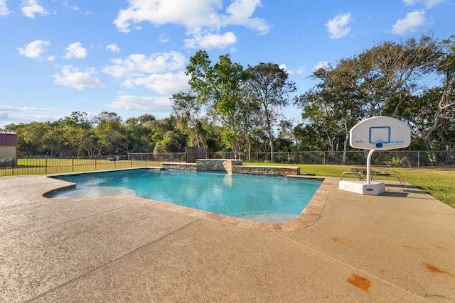 view of pool featuring a lawn, a patio area, a fenced backyard, and a fenced in pool