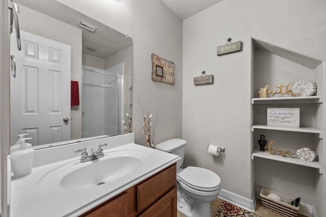 bathroom with visible vents, toilet, a stall shower, vanity, and baseboards