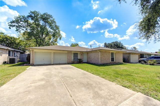 ranch-style house featuring cooling unit, a front lawn, and a garage