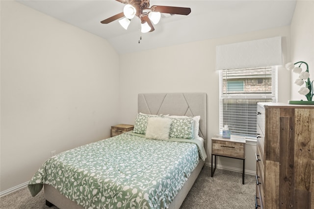 carpeted bedroom with lofted ceiling and ceiling fan