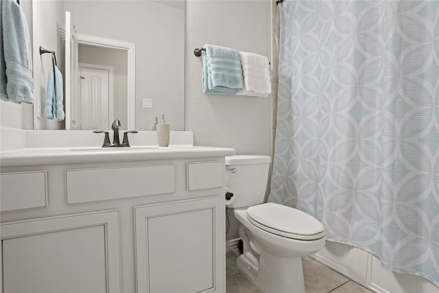 full bathroom featuring shower / tub combo, tile patterned flooring, vanity, and toilet