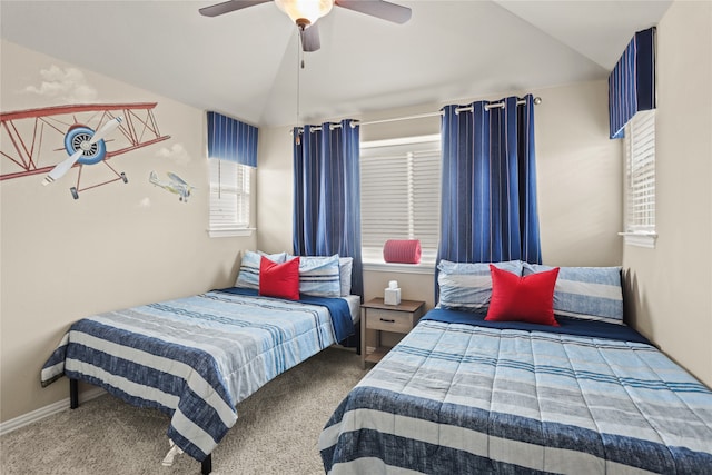 carpeted bedroom with ceiling fan and lofted ceiling