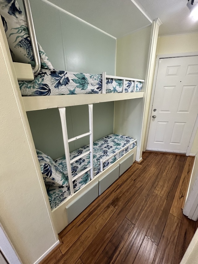 6102 Seawall Blvd Unit 375, Galveston, TX 77551 - bedroom with hardwood / wood-style flooring