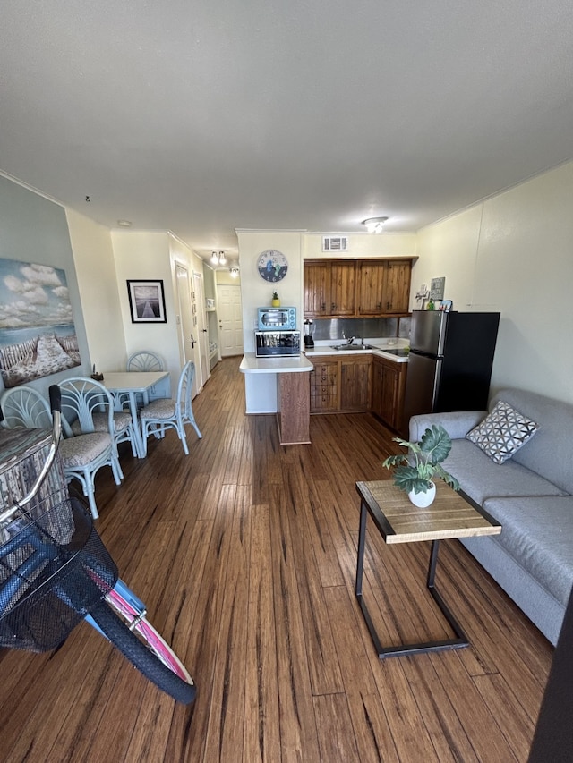 6102 Seawall Blvd Unit 375, Galveston, TX 77551 - living room with dark wood-type flooring